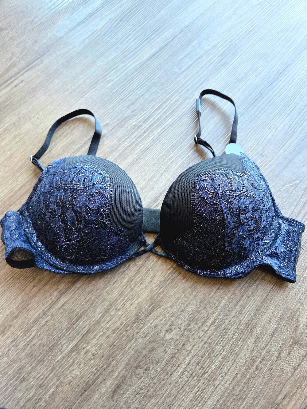 Victoria's Secret Bombshell Push-Up Bra. Black mesh with shimmery blue lace. 34A